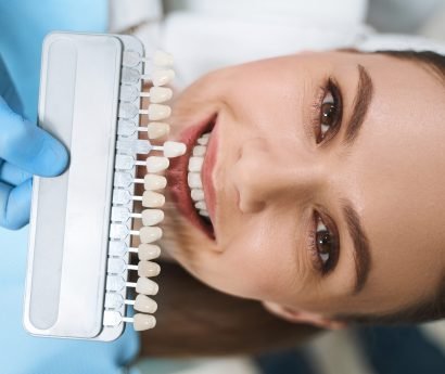 happy-young-lady-is-visiting-dental-clinic-taking-care-teeth-getting-better-smile